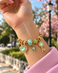 Armreif mit Charms G